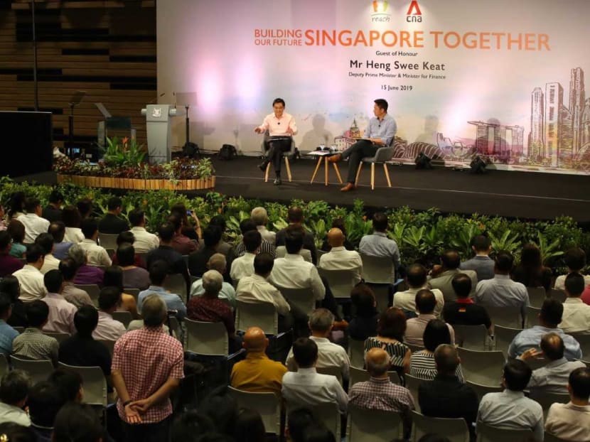 Mr Heng addressing the audience at Saturday's dialogue titled Building our Future of Singapore Together.