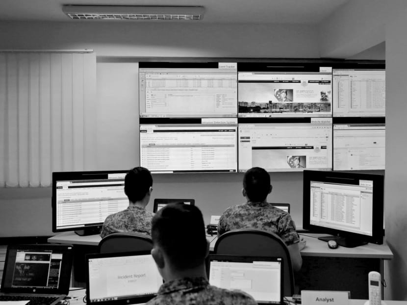 SAF servicemen demonstrating how they would respond to a website defacement attack at the Cyber Security Operations Centre. Military power is not the only weapon in modern warfare. TODAY file photo