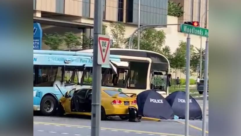 2 dead after car and bus collide at Woodlands junction 2 dead after car and bus collide at Woodlands junction