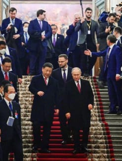 Russian President Vladimir Putin and Chinese President Xi Jinping leave after a reception in honor of the Chinese leader's visit to Moscow, at the Kremlin in Moscow, Russia March 21, 2023. Sputnik/Pavel Byrkin/Kremlin via REUTERS 