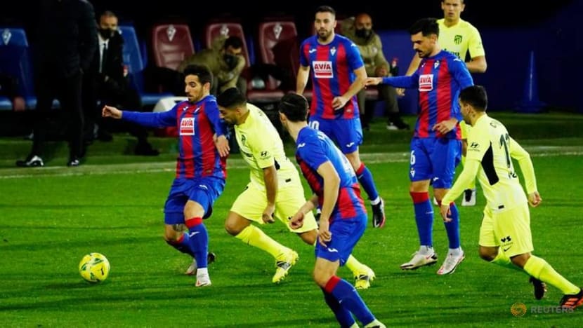 Suarez secures Atletico win despite Eibar's keeper scoring a penalty Suarez secures Atletico win despite Eibar's keeper scoring a penalty
