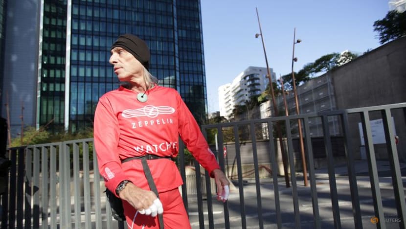 'French Spiderman' climbs Paris skyscraper to mark turning 60 'French Spiderman' climbs Paris skyscraper to mark turning 60