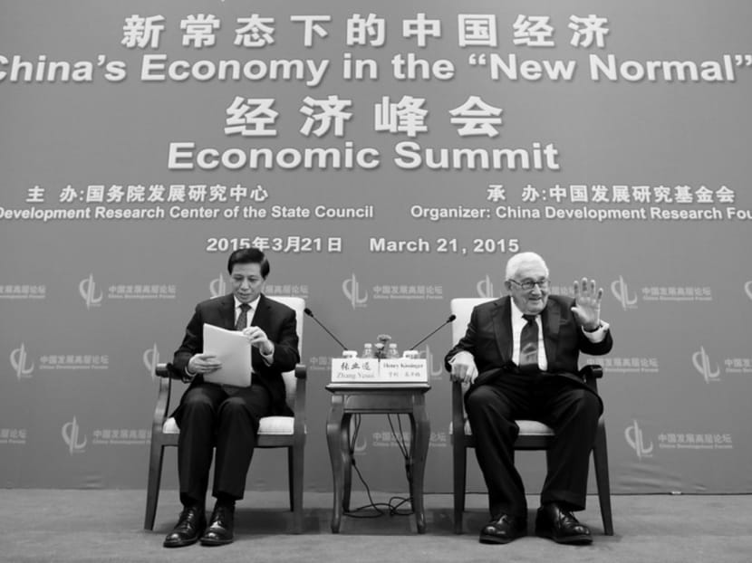 Former US Secretary of State Henry Kissinger and Chinese Vice-Foreign Minister Zhang Yesui at the China Development Forum in Beijing last month. Mr Kissinger stressed that today’s challenges can be addressed only through collaborative strategic engagement. Photo: REUTERS