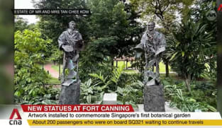 Pair of bronze figures installed at Fort Canning to commemorate Singapore's first botanical garden