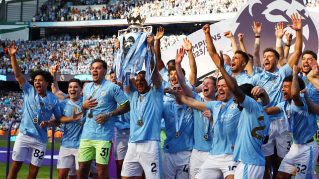 Manchester City win unprecedented fourth successive league title