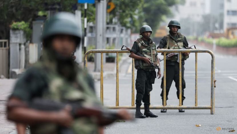 Sri Lanka whisks former PM to naval base as troops patrol streets Sri Lanka whisks former PM to naval base as troops patrol streets