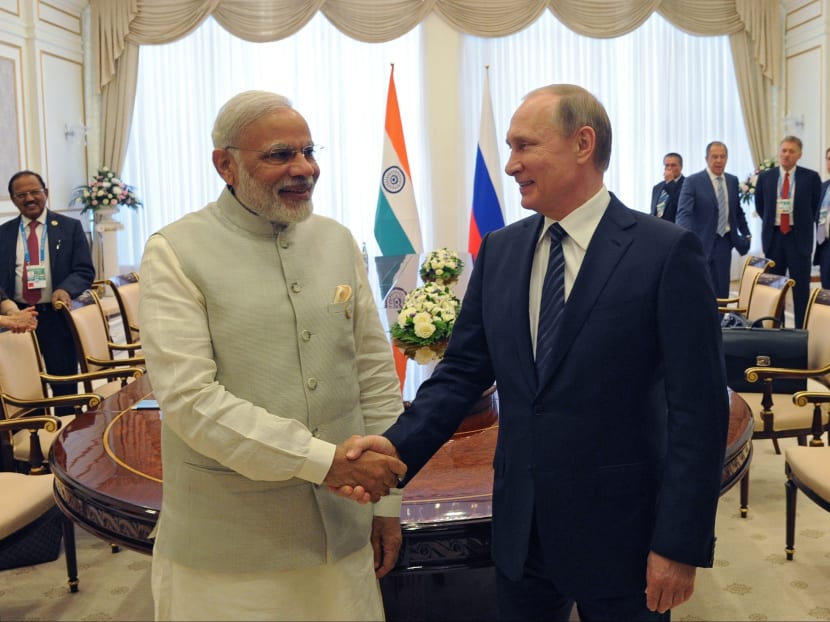 Indian Prime Minister Narendra Modi (left) seen here with Russian President Vladimir Putin in Tashkent. India has been lobbying for membership to the Nuclear Suppliers Group but to no avail. Photo: Kremlin Pool Photo via AP