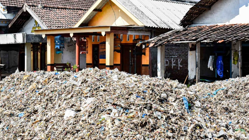 The Indonesian village being buried by the developed world’s waste