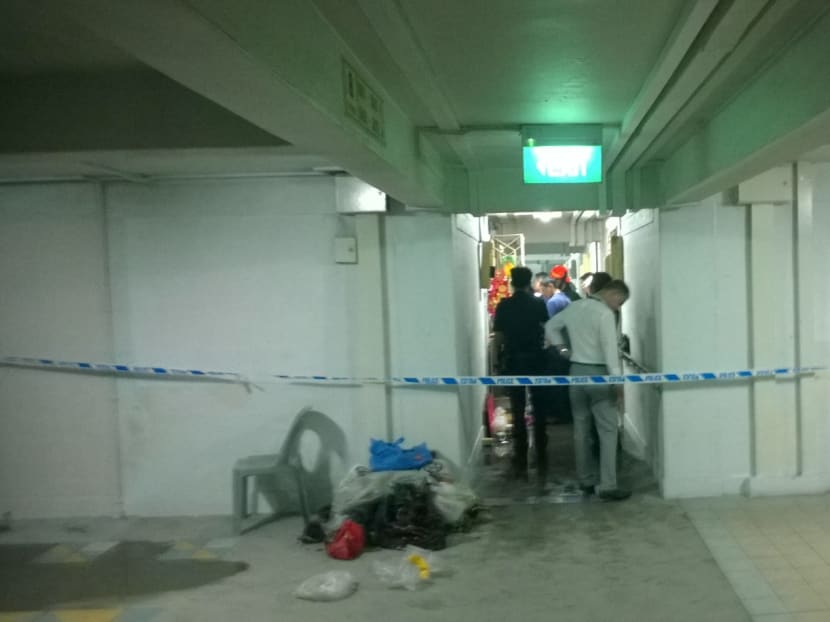 Gallery: One dead, two injured following slashing and fire at Marsiling Road