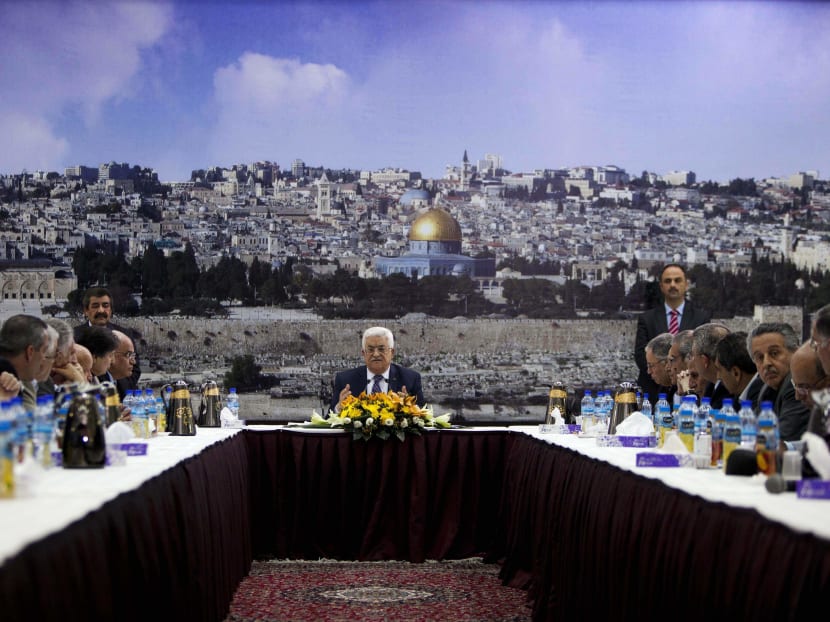 In this April 1, 2014 file photo Palestinian President Mahmoud Abbas talks during a leadership meeting in Ramallah. The examples from recent weeks signal that disagreeing with Abbas and his inner circle comes at a price for Palestinians. Critics say that after a decade in power, Abbas has created an increasingly authoritarian system with little room for dissent. Photo: AP