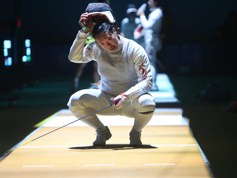 Singaporean fencer Wang Wenying is among several athletes set to receive a boost from the Government as they chase their dream of Olympic glory. TODAY file photo