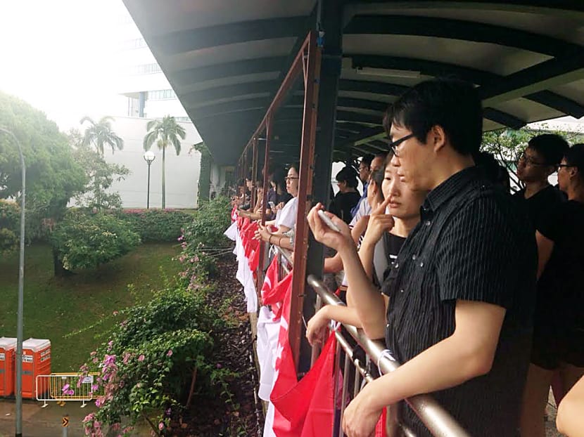Gallery: Longer wait for those in Clementi, but they stayed to bid farewell