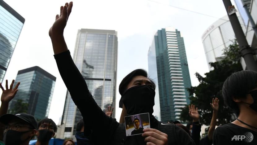Hundreds of black-clad activists chant 'Liberate Hong Kong' outside High Court