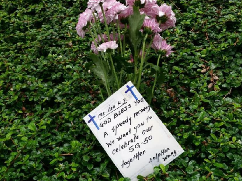 Flowers for Mr Lee Kuan Yew and a note wishing him a speedy recovery were placed on a lawn at Singapore General Hospital this afternoon. Photo: Amanda Lee