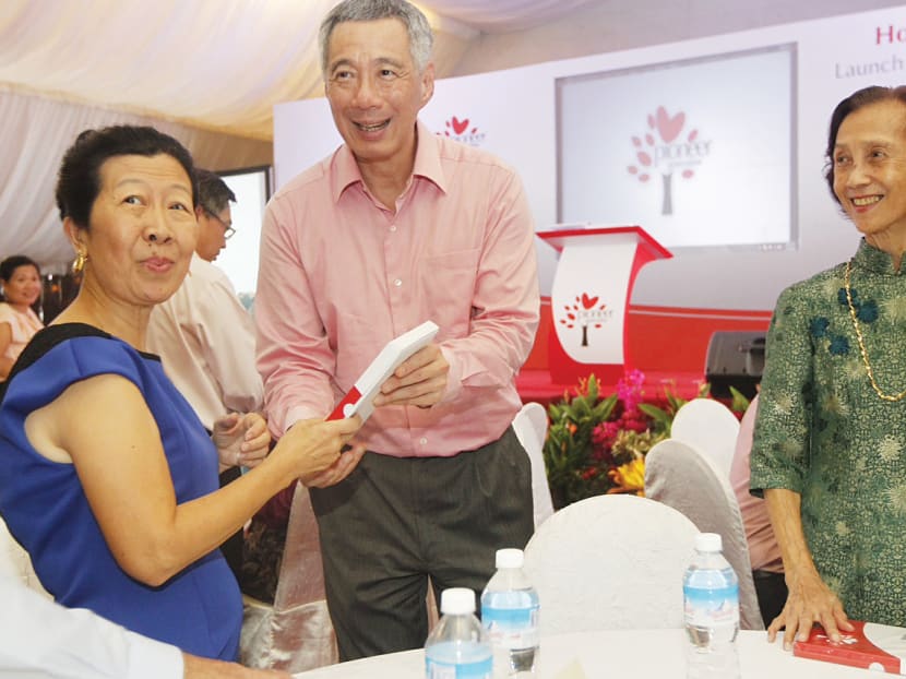 Gallery: 100 receive Pioneer Generation cards from PM Lee at launch