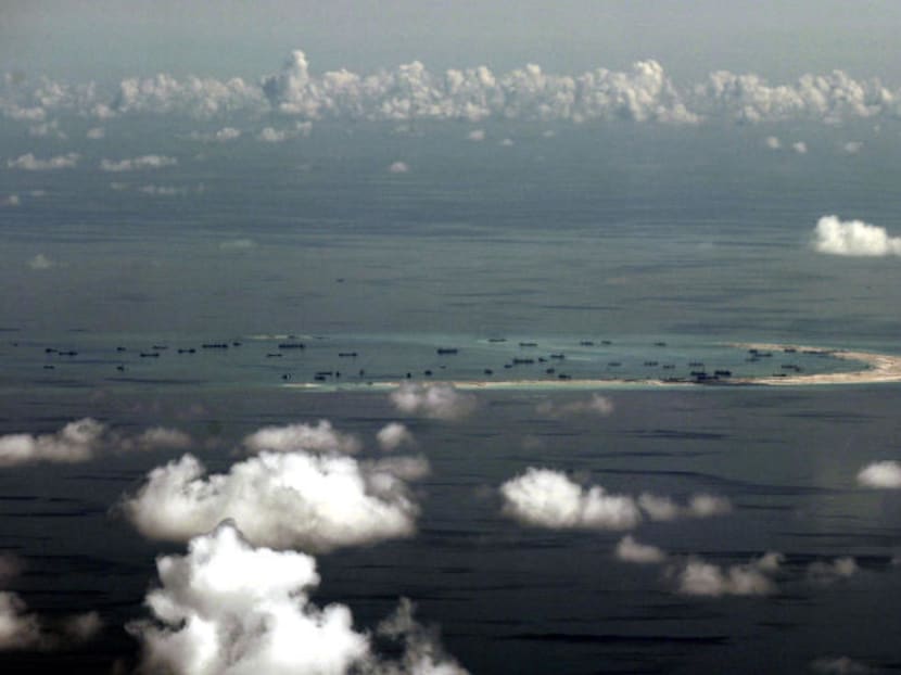 An aerial photo taken from a military plane shows China's reclamation of Mischief Reef in the Spratly Islands. Photo: AP