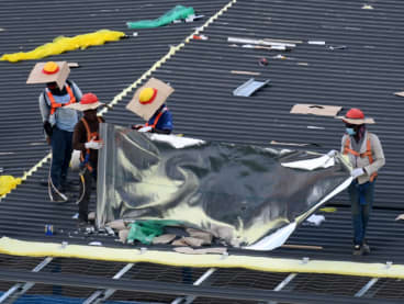 Migrant workers are seen working outdoors in Singapore at a construction site. A TODAY reader has called for more stringent penalties targeting employers amid the spate of workplace accidents in Singapore. 

