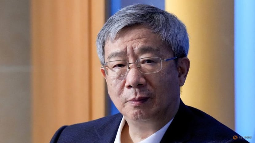 China's central bank chief signals phasing out currency intervention China's central bank chief signals phasing out currency intervention