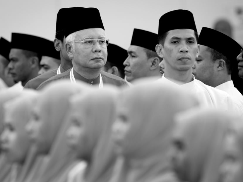 Malaysian Prime Minister Najib Razak (centre) is keen to secure a convincing Umno victory for Malay-Muslim majority areas Kuala Kangsar and Sungai Besar, to prove that he and Umno remain popular with the party’s core support group. Photo: AP