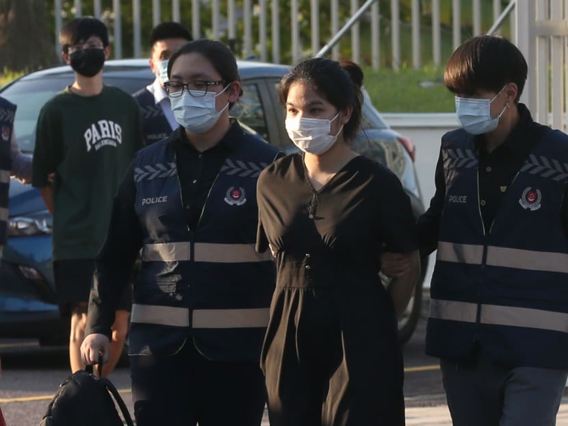 Luxury goods scam: Fugitive couple arrested in Johor Bahru, brought back to Singapore Luxury goods scam: Fugitive couple arrested in Johor Bahru, brought back to Singapore