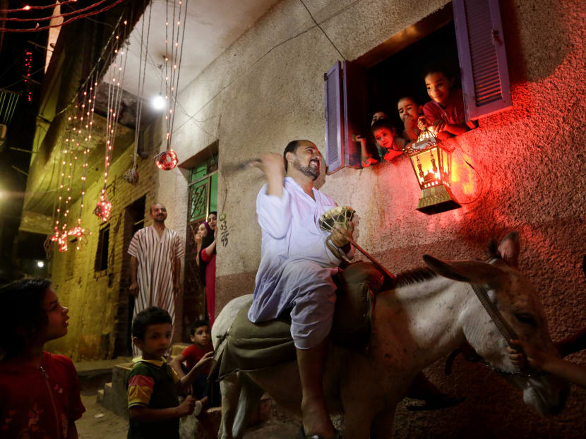 At Ramadan, Cairo callers wake you up before dawn