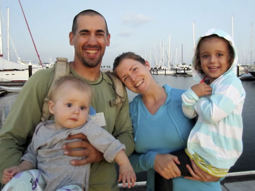 This undated image provided by Ms Sariah English shows Mr Eric and Mrs Charlotte Kaufman with their daughters, Lyra, 1, and Cora, 3. Photo: AP