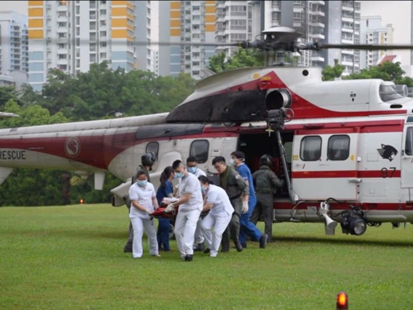 One of the four rescued men being stretchered off the RSAF Rescue 10 helicopter on Thursday (Jan 16).