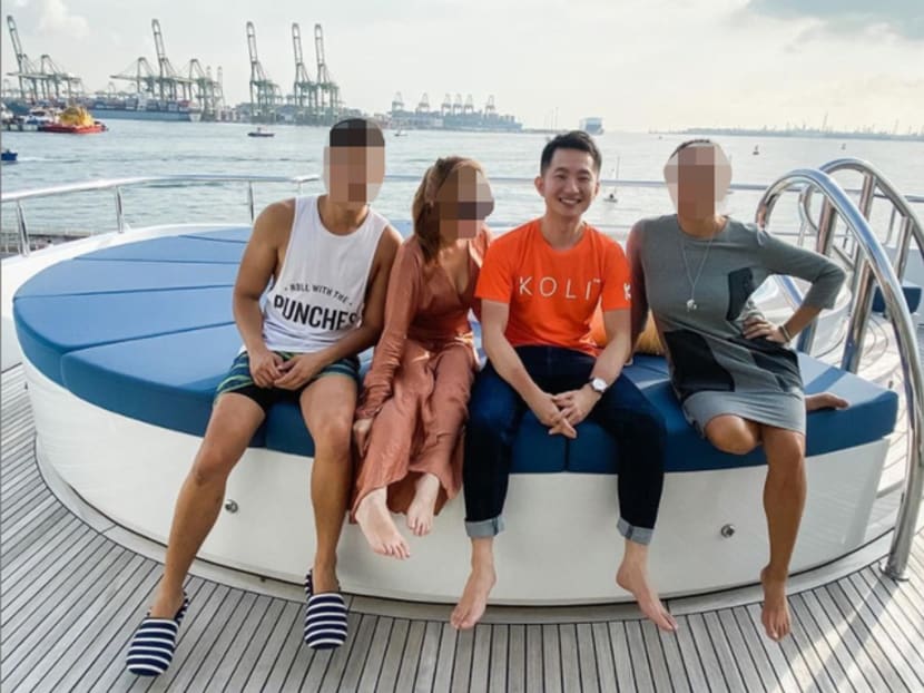 Lim Tian Yi (second from right) on board a yacht in a photograph posted on social media.
