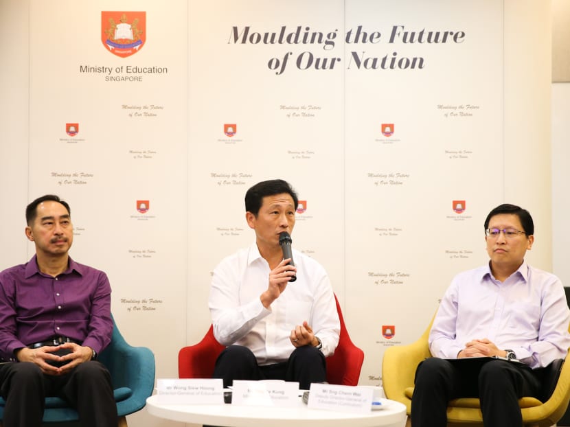(From left) Mr Wong Siew Hoong, Director-General of Education, Minister for Education Ong Ye Kung and Mr Sng Chern Wei, Deputy Director-General of Education (Curriculum) at a press briefing at the Ministry of Education on Friday (Sept 28).
