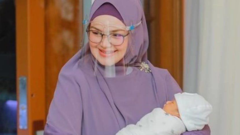 Malaysian singer Siti Nurhaliza and husband fined RM20,000 for baby’s ceremony which breached COVID-19 protocols