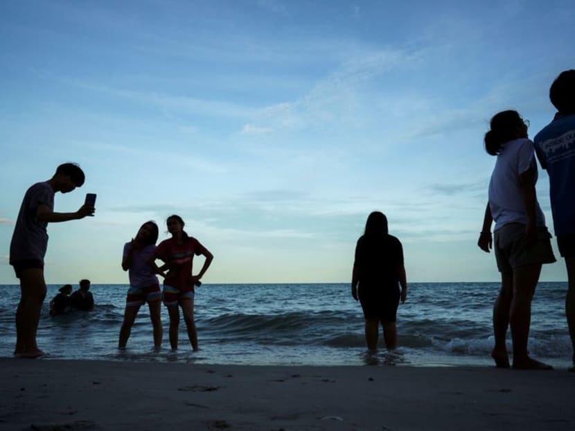 FILE PHOTO: People enjoy Cha-am Beach in Phetchaburi province, Thailand, September 26, 2020. REUTERS/Athit Perawongmetha/File Photo FILE PHOTO: People enjoy Cha-am Beach in Phetchaburi province, Thailand, September 26, 2020. REUTERS/Athit Perawongmetha/File Photo