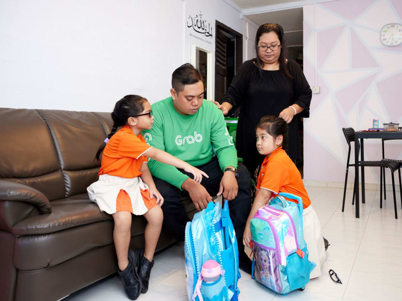Mr Sarifee chose a career with Grab as its flexible working hours allowed him to spend more time with his family. Photos: Mediacorp