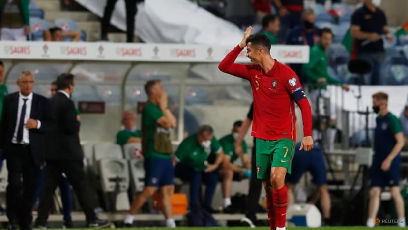 Football: Ronaldo claims world record with late late show Football: Ronaldo claims world record with late late show