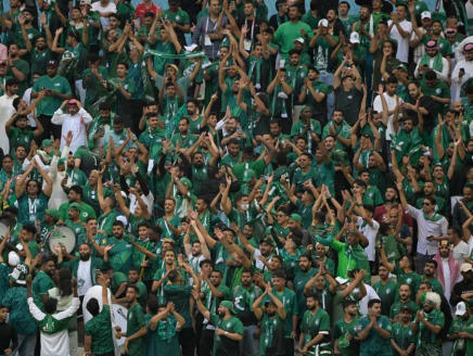 Saudi Arabia supporters celebrate their victory in the Qatar 2022 World Cup Group C football match between Argentina and Saudi Arabia at the Lusail Stadium in Lusail, north of Doha on Nov 22, 2022.