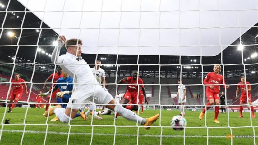 Football: Leipzig stay top with win at Augsburg, Dortmund edge past Hoffenheim Football: Leipzig stay top with win at Augsburg, Dortmund edge past Hoffenheim
