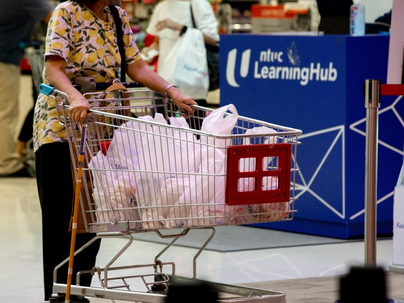 Shoppers will have to pay at least five cents for each plastic bag they take at major supermarkets from mid-2023. 