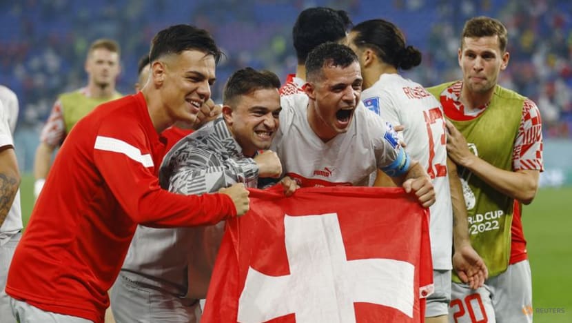 Switzerland edge Serbia in goalfest to reach last 16