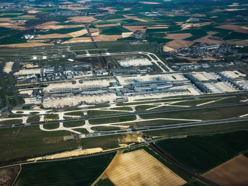This file photo taken on April 05, 2019 shows an aerial picture of the Charles de Gaulle international airport, also known as Roissy Airport. The French government has decided to abandon the project to extend Roissy-Charles de Gaulle airport, describing it as "obsolete" at a time of the fight against global warming.