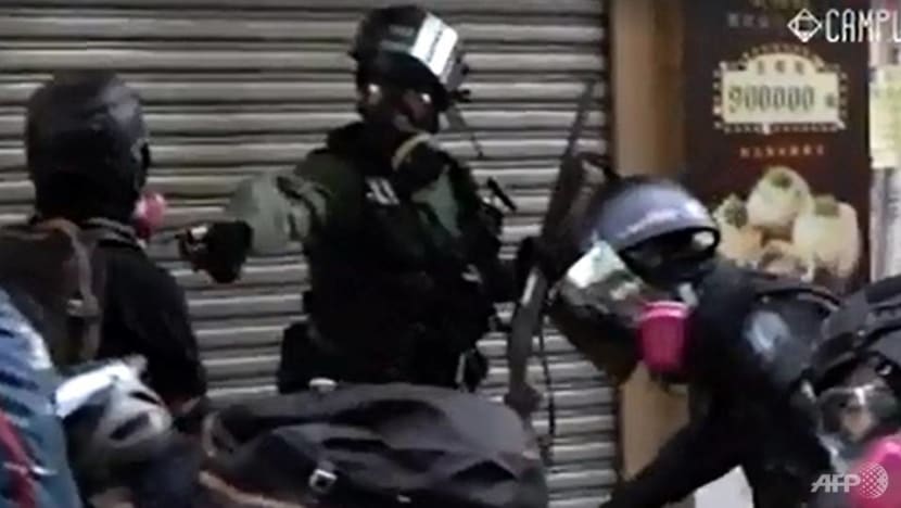 Clashes intensify across Hong Kong after police shoot protester in chest Clashes intensify across Hong Kong after police shoot protester in chest