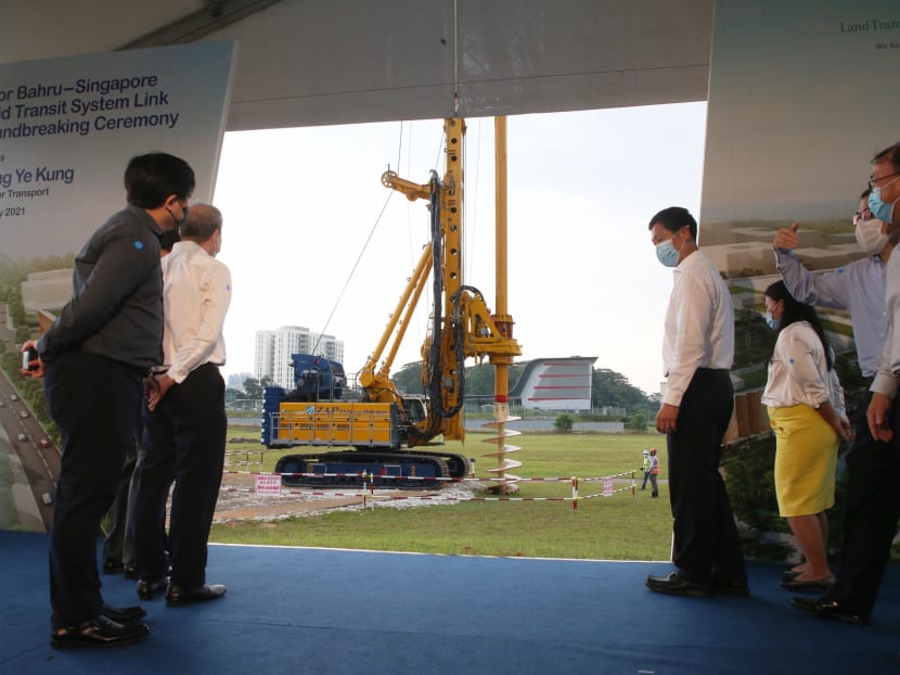 Minister for Transport Ong Ye Kung watches a rotary drilling rig drill into the ground at the Johor Bahru-Singapore Rapid Transit System Link Groundbreaking Ceremony on Jan 22, 2021.