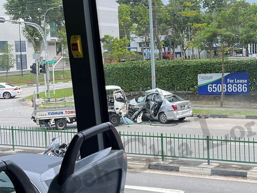 A photograph of a collision between a lorry and a private-hire vehicle at Ang Mo Kio on Oct 16, 2022, that was circulating on social media.