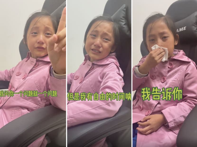 In a video on social media, a girl tells her father in between sobs (pictured) that she has been "a good girl every single day" and she needs down time from school work. In a video on social media, a girl tells her father in between sobs (pictured) that she has been "a good girl every single day" and she needs down time from school work.