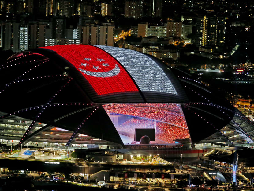 The Singapore flag displayed on the top of the National Stadium during the SEA Games opening ceremony. Photo: Ernest Chua/TODAY
