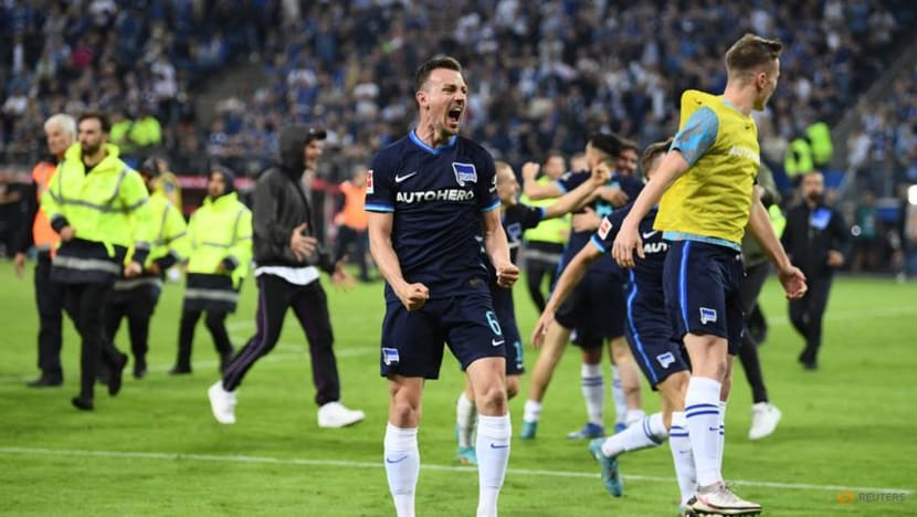 Hertha Berlin win playoff to deny Hamburg promotion to Bundesliga Hertha Berlin win playoff to deny Hamburg promotion to Bundesliga