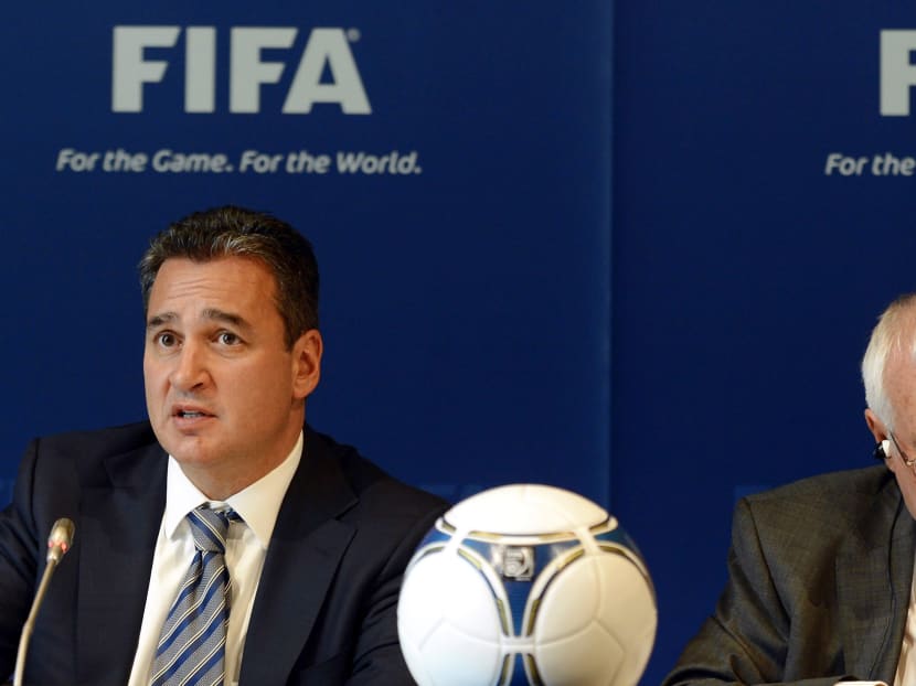 In this Friday, July 27, 2012 file photo, Chairmen of the two chambers of the new FIFA Ethics Committee Michael Garcia, left, from the US and Joachim Eckert, right, from Germany attend a press conference, at the Home of FIFA in Zurich, Switzerland. Photo: AP