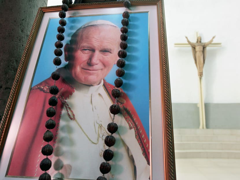 A picture of the late Pope John Paul II at a mass in his honour at the Metropolitan Cathedral in Managua. Photo: Reuters
