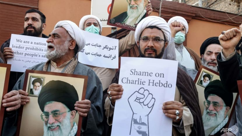 Iranians protest outside French embassy after cartoons Iranians protest outside French embassy after cartoons