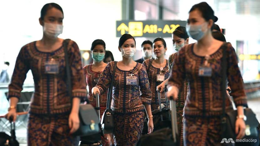 SIA cabin crew to wear face masks on flights as a 'precautionary measure' amid COVID-19 concerns