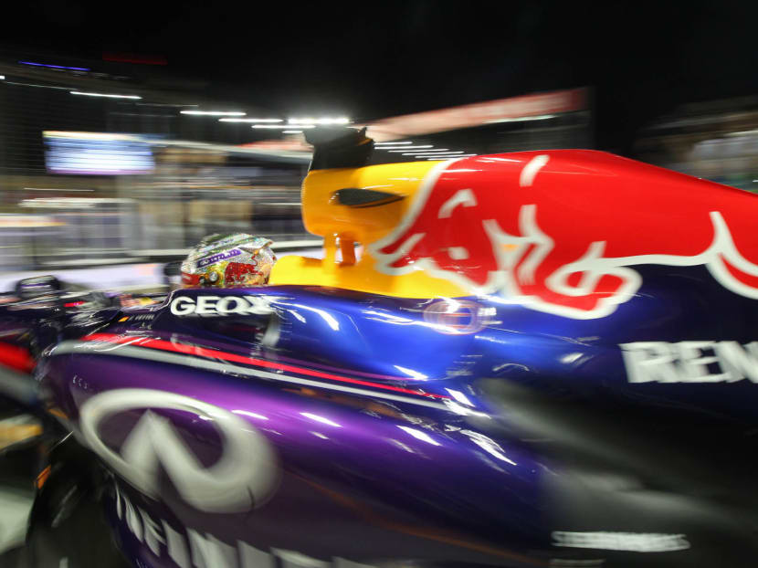 Sebastian Vettel of Red Bull Racing drives in a practice session at Singapore Grand Prix on Sept 20, 2013. Photo: Wee Teck Hian