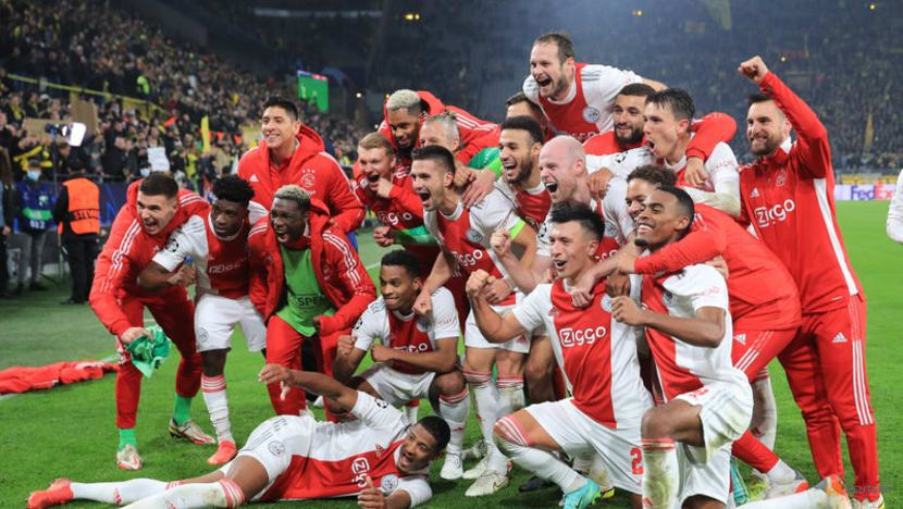 Ajax win at Dortmund to qualify for last 16 Ajax win at Dortmund to qualify for last 16